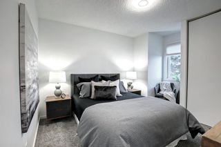 Photo 28: 14 Coachway Gardens SW in Calgary: Coach Hill Row/Townhouse for sale : MLS®# A1215253