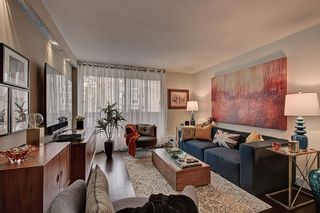 Photo 2: 403 1709 19 Avenue SW in Calgary: Bankview Apartment for sale : MLS®# A1214731