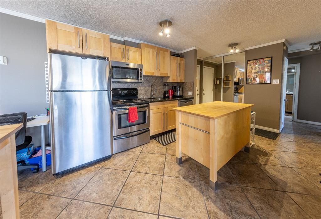 Photo 5: Photos: 206 1040 15 Avenue SW in Calgary: Beltline Apartment for sale : MLS®# A1195527