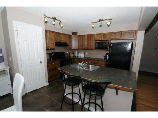Photo 4: 341 Cimarron Boulevard: Okotoks Residential Detached Single Family for sale : MLS®# C3515033