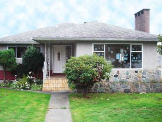 Photo 1: 1448 E 62ND Avenue in Vancouver: Fraserview VE House for sale (Vancouver East)  : MLS®# V856720