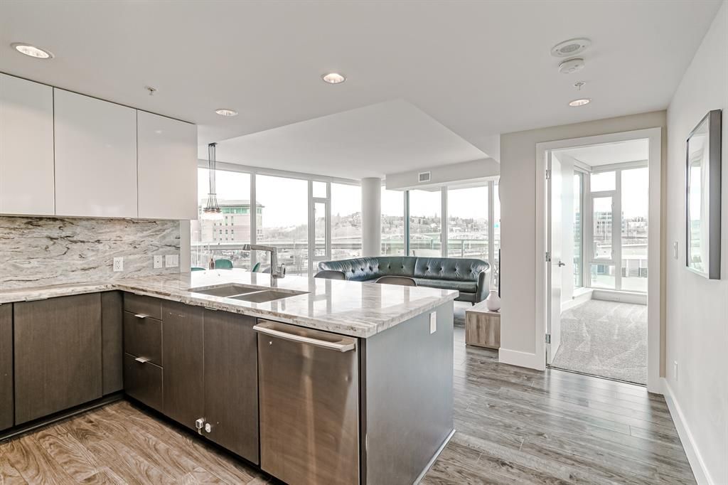 Main Photo: 302 519 Riverfront Avenue SE in Calgary: Downtown East Village Apartment for sale : MLS®# A2050093