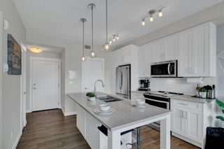 Photo 4: 210 300 Auburn Meadows Common SE in Calgary: Auburn Bay Apartment for sale : MLS®# A2131157