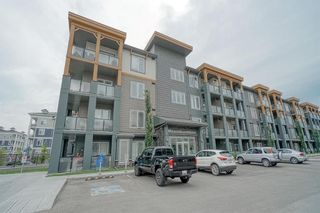 Photo 1: 306 100 Auburn Meadows Manor SE in Calgary: Auburn Bay Apartment for sale : MLS®# A1245562
