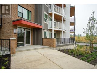 Photo 1: 625 Academy Way Unit# 110 in Kelowna: House for sale : MLS®# 10303620