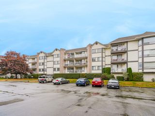 Photo 2: 110 5710 201 Street in Langley: Langley City Condo for sale : MLS®# R2734076