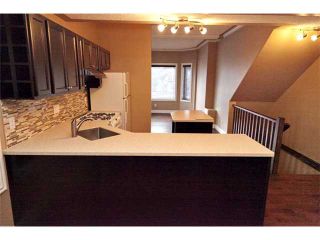 Photo 2: 6 1720 11 Street SW in CALGARY: Lower Mount Royal Townhouse for sale (Calgary)  : MLS®# C3500071