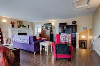 Photo 33: 14 448 Strathcona Drive SW in Calgary: Strathcona Park Row/Townhouse for sale : MLS®# A1221433