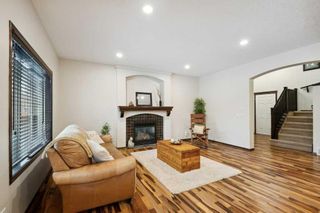 Photo 6: 306 Autumn Circle SE in Calgary: Auburn Bay Detached for sale : MLS®# A2097084