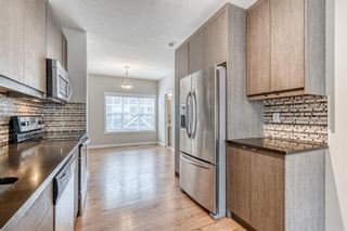 Photo 5: 113 Marquis Lane SE in Calgary: Mahogany Row/Townhouse for sale : MLS®# A1221843