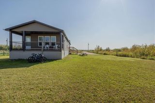 Photo 1: 97 Upstream Crescent in St Malo: R17 Residential for sale : MLS®# 202324424