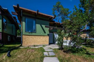 Photo 1: 613 - 615 Sabrina Road SW in Calgary: Southwood Full Duplex for sale : MLS®# A1244966