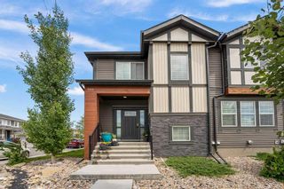 Photo 1: 303 Hillcrest Drive SW: Airdrie Row/Townhouse for sale : MLS®# A2054077