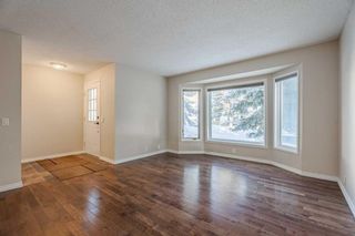 Photo 7: 47 Strathearn Crescent SW in Calgary: Strathcona Park Detached for sale : MLS®# A2105994