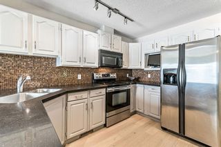 Photo 7: 103 Citadel Heights NW in Calgary: Citadel Row/Townhouse for sale : MLS®# A1206475