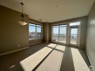 Photo 2: 5 132 Rockyledge View NW in Calgary: Rocky Ridge Row/Townhouse for sale : MLS®# A2027628