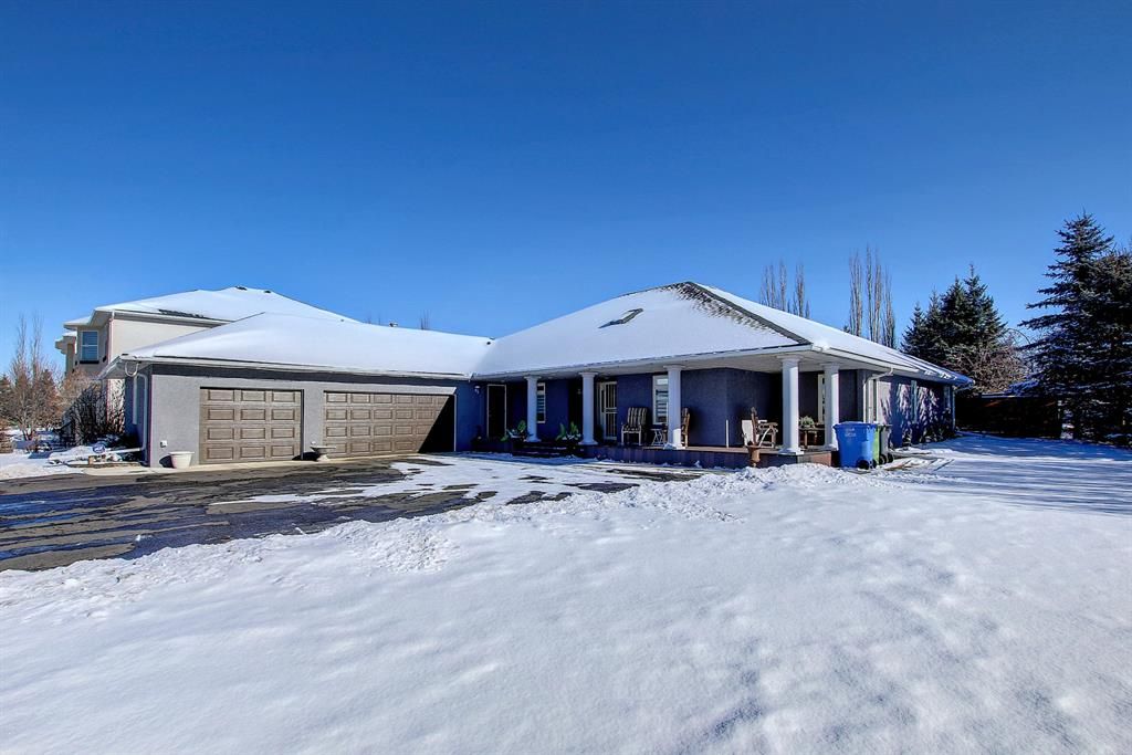This beautiful bungalow is situated on an almost half a acre lot across from the lake!