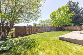 Photo 11: 807 Cannell Road SW in Calgary: Canyon Meadows Detached for sale : MLS®# A1120563