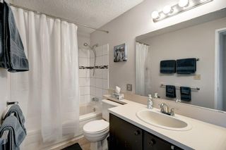 Photo 15: 143 Woodvale Bay SW in Calgary: Woodlands Row/Townhouse for sale : MLS®# A2022754