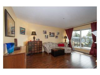 Photo 2: 103 2250 SE MARINE Drive in Vancouver: Fraserview VE Condo for sale in "WATERSIDE" (Vancouver East)  : MLS®# V1110847
