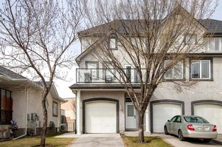 Photo 1: 180 Simcoe Place SW in Calgary: Signal Hill Row/Townhouse for sale : MLS®# A1218089