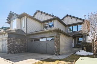 Main Photo: 157 Cougarstone Place SW in Calgary: Cougar Ridge Semi Detached (Half Duplex) for sale : MLS®# A2116687