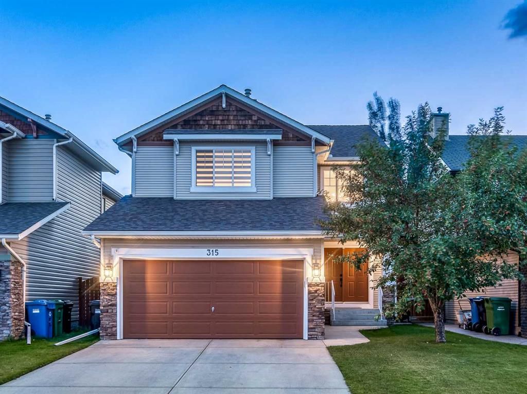 Main Photo: 315 Cougarstone Circle SW in Calgary: Cougar Ridge Detached for sale : MLS®# A2066016