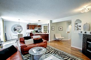 Photo 4: 311 Cougarstone Circle SW in Calgary: Cougar Ridge Detached for sale : MLS®# A2048035