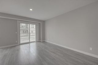 Photo 9: 405 Redstone View NE in Calgary: Redstone Row/Townhouse for sale : MLS®# A1224923