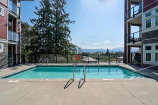 Photo 2: 202 2238 WHATCOM Road in Abbotsford: Abbotsford East Condo for sale in "Waterleaf" : MLS®# R2726040