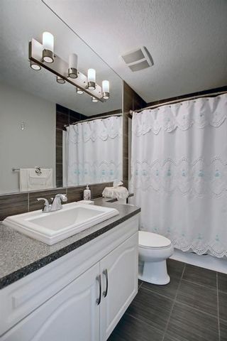 Photo 32: 136 Rainbow Falls Lane: Chestermere Detached for sale : MLS®# A1242857