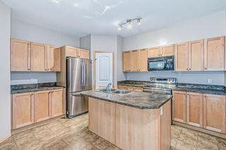 Photo 16: 104 151 Panatella Landing NW in Calgary: Panorama Hills Row/Townhouse for sale : MLS®# A2020288