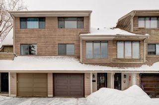 Photo 1: 143 Woodvale Bay SW in Calgary: Woodlands Row/Townhouse for sale : MLS®# A2022754