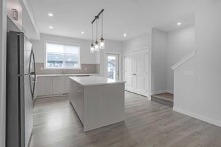 Photo 12: 1902 Jumping Pound Common: Cochrane Row/Townhouse for sale : MLS®# A2137478