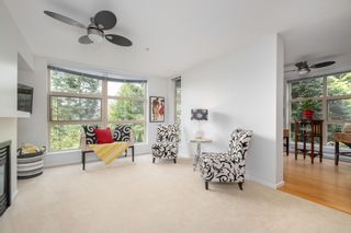 Photo 2: 404 9339 UNIVERSITY Crescent in Burnaby: Simon Fraser Univer. Condo for sale in "HARMONY AT THE HIGHLANDS" (Burnaby North)  : MLS®# R2578073