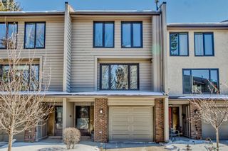Photo 1: 3803 Point Mckay Road NW in Calgary: Point McKay Row/Townhouse for sale : MLS®# A2034435