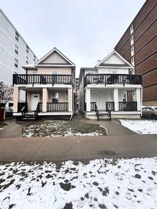 Photo 1: 1220 14 Avenue SW in Calgary: Beltline Detached for sale : MLS®# A2123540