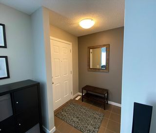 Photo 2: 21 RIVER HEIGHTS Link: Cochrane Row/Townhouse for sale : MLS®# C4286639