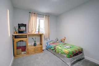 Photo 25: 633 Redstone Drive NE in Calgary: Redstone Semi Detached (Half Duplex) for sale : MLS®# A2010252