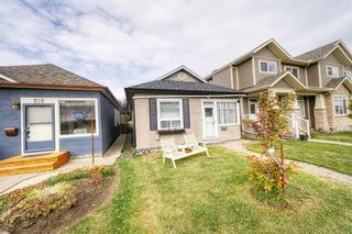 Photo 4: 210 20 Avenue NW in Calgary: Tuxedo Park Detached for sale : MLS®# A2084355
