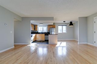Photo 6: 1015 1540 29 Street NW in Calgary: St Andrews Heights Row/Townhouse for sale : MLS®# A1209846