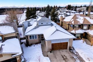Photo 1: 113 Woodridge Close SW in Calgary: Woodbine Detached for sale : MLS®# A1060325
