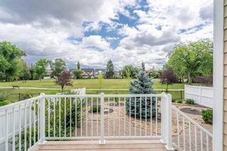 Photo 4: 16 Johnson Place SW in Calgary: Garrison Green Detached for sale : MLS®# A2117897