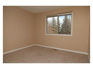 Photo 18: 983 WOODBINE Boulevard SW in CALGARY: Woodbine Residential Detached Single Family for sale (Calgary)  : MLS®# C3500727