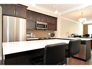 Photo 6: 60 7090 180TH Street in Surrey: Cloverdale BC Townhouse for sale in "THE BOARDWALK" (Cloverdale)  : MLS®# F1323453