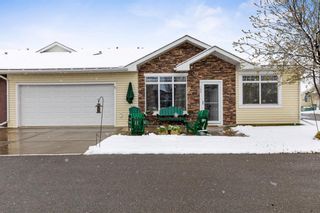 Photo 1: 102 Sunvale Crescent NE: High River Row/Townhouse for sale : MLS®# A1215956