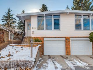 Photo 3: 2611 CANMORE RD NW in Calgary: Banff Trail House for sale : MLS®# C4146643