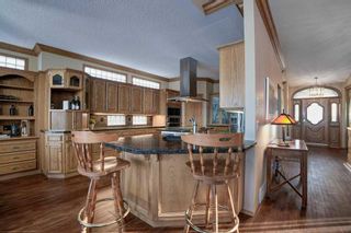 Photo 15: 135 Strathearn Place SW in Calgary: Strathcona Park Detached for sale : MLS®# A2091506