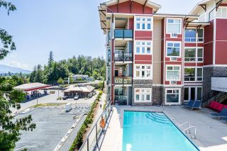 Photo 1: 301 2238 WHATCOM Road in Abbotsford: Abbotsford East Condo for sale in "WATERLEAF" : MLS®# R2897413
