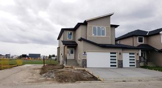 Photo 1: 1324 Lackner Boulevard: Carstairs Detached for sale : MLS®# A1208948